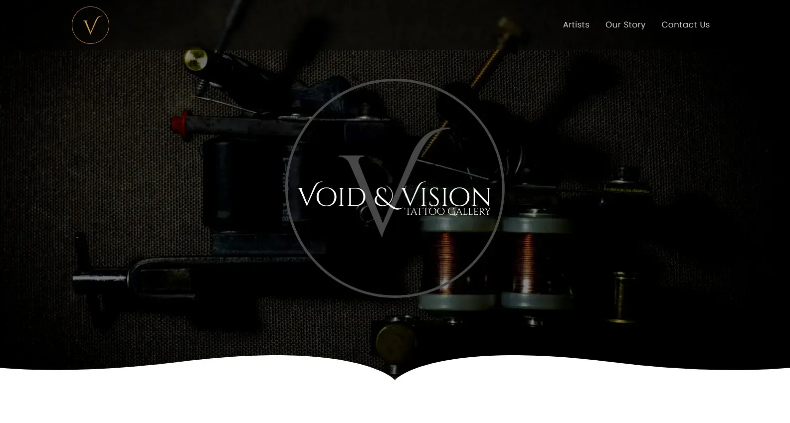 The Void & Vision homepage: a near-black hero with a circular monogram and serif wordmark over a close-up of a tattoo machine.